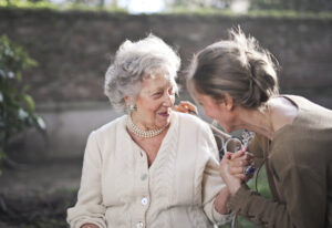 Two adult women beside each other